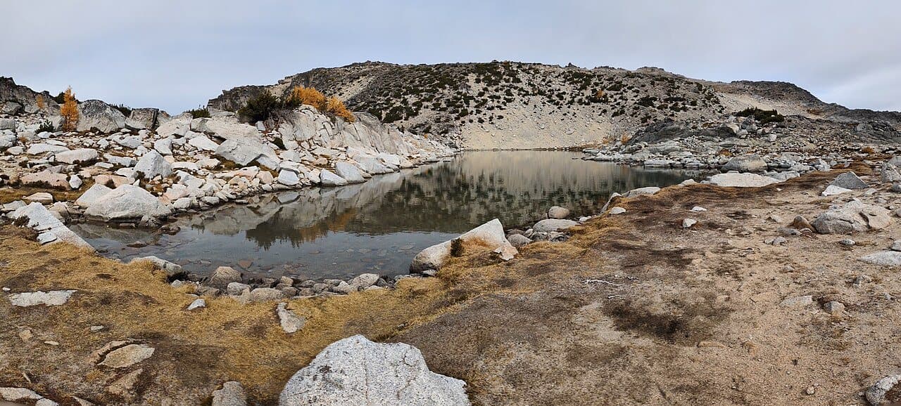 Tranquil Lake among granite slabs in the Upper Enchantments