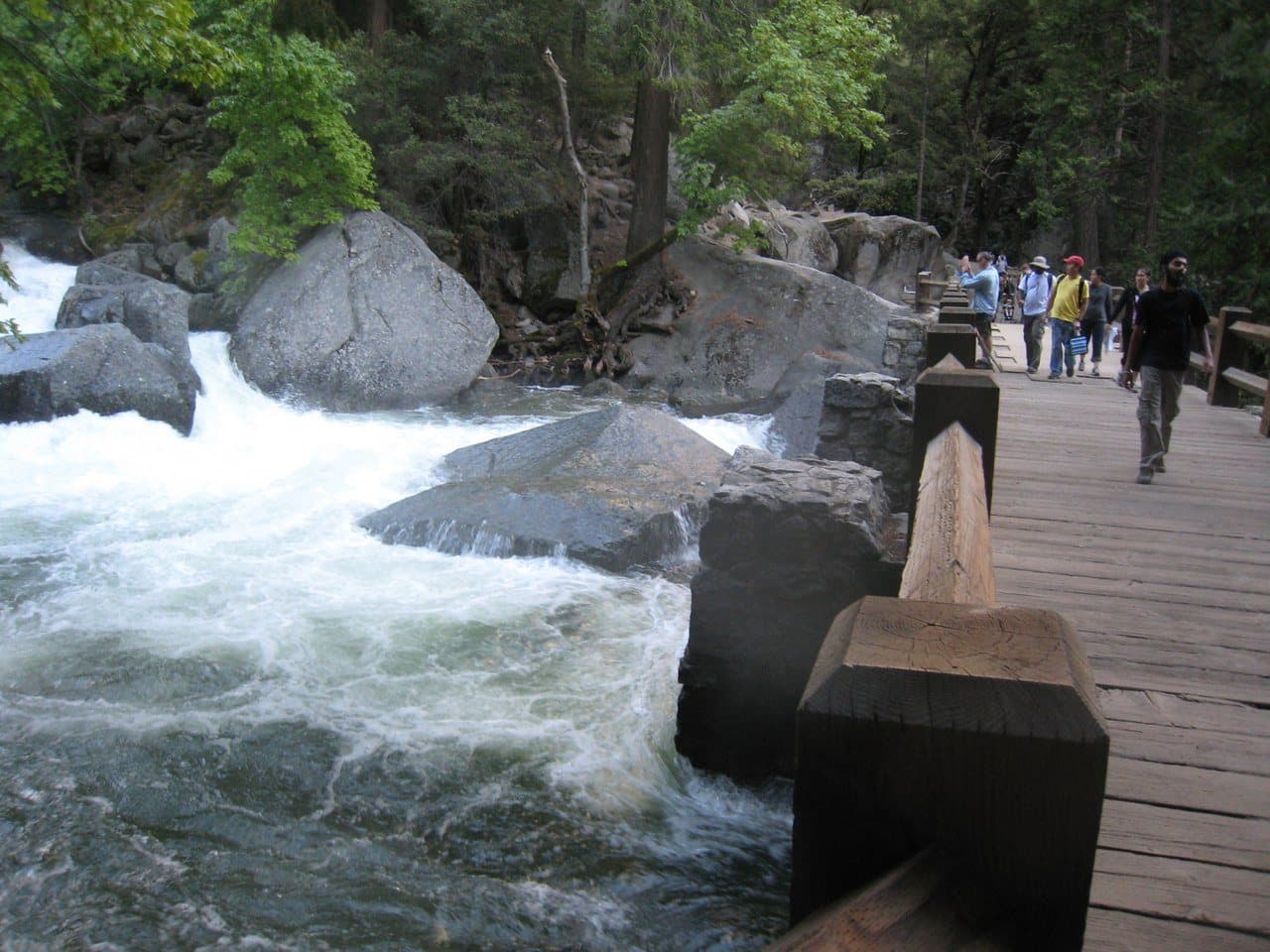 Hikers on the Vernal Fall Footbridge above the Merced River
