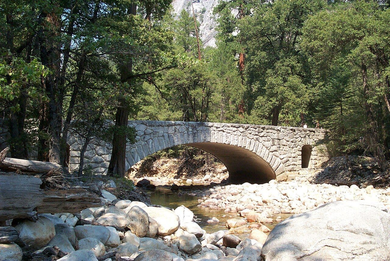 The stone Happy Isles Bridge over the Merced River in Yosemite Valley