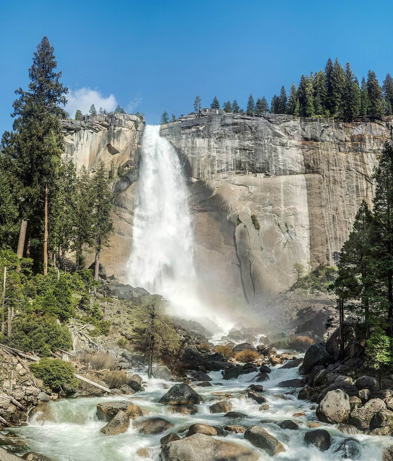 Nevada Fall pouring over a granite cliff, seen from the Mist Trail