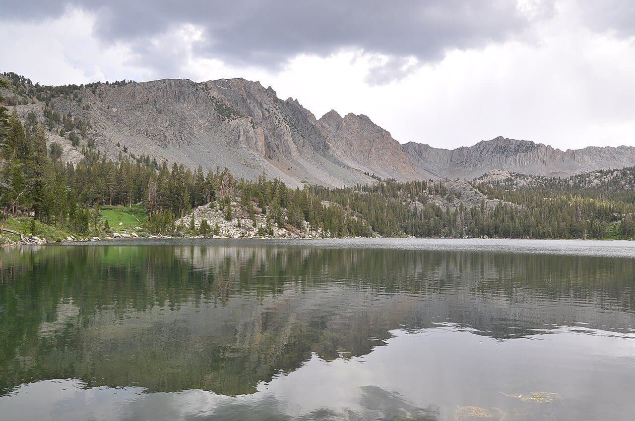 Purple Lake reflecting the ridge above it