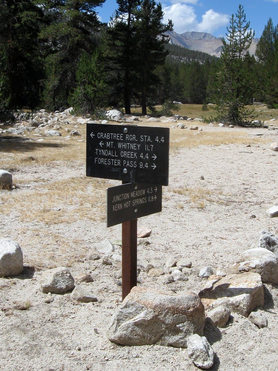 The trail sign at the Wallace Creek junction of the John Muir and High Sierra trails