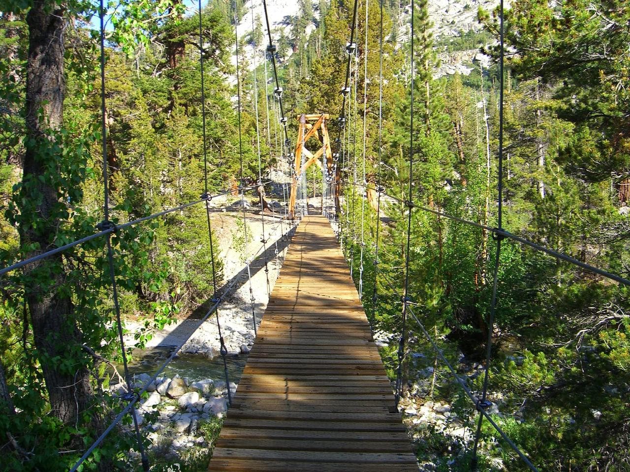 The suspension bridge that carries the trail over Woods Creek