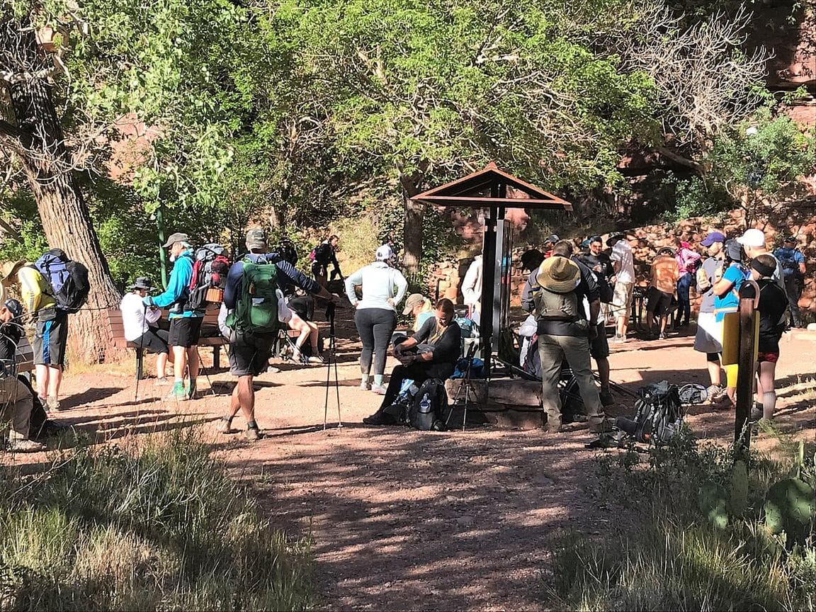 Hikers resting in the shade at Manzanita Rest Area