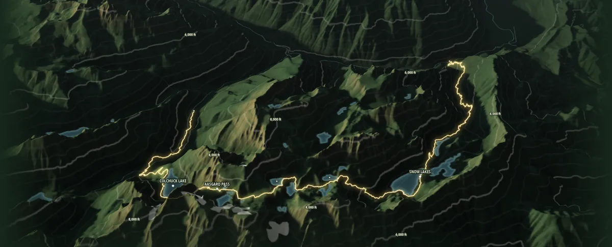 Three-dimensional relief of the Enchantments Through-Hike from Stuart/Colchuck Lake Trailhead to Snow Lakes Trailhead, the trail in gold over the terrain, lakes and contours, with Colchuck Lake, Aasgard Pass and Snow Lakes named